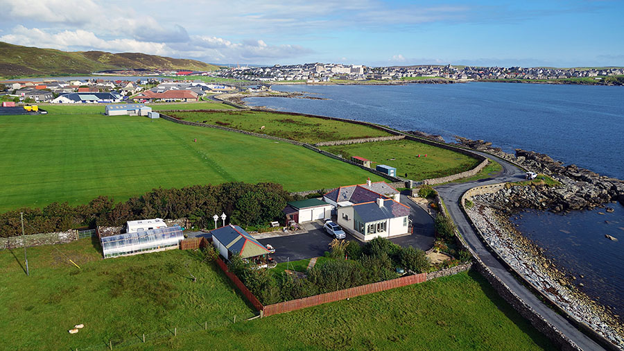 An aerial photograph of a property in Seafield, Lerwick, used for marketing purposes